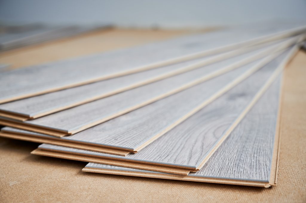 laminate flooring stacked onto a surface for installation